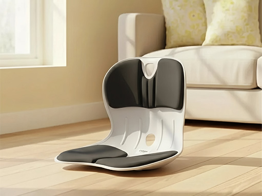 柯柏蓝护腰坐垫特写,深蓝色记忆棉材质,人体工学弧形设计,正面展示支撑腰部曲线效果